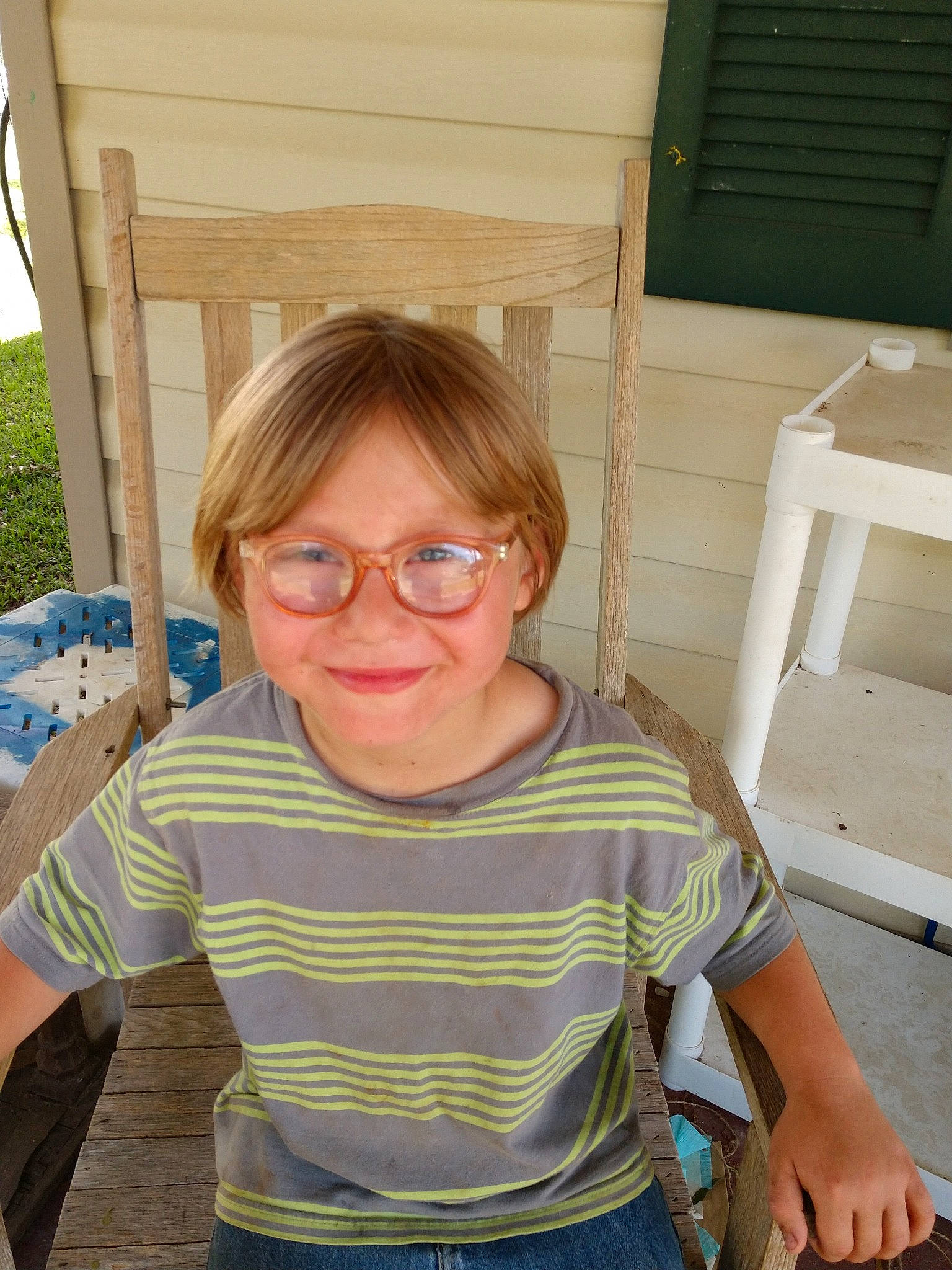 T.j joined the competition — help win amazing prizes! blond, child, eyewear, glasses, person, shoulder, sitting, smile, t_shirt, vacation, vision_care