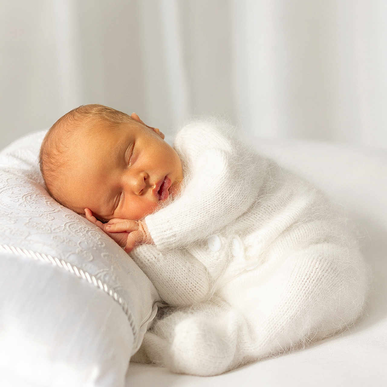 Otto joined the competition — help win amazing prizes! baby, blanket, calm, child, cozy, cute, face, indoor, infant, knitted_clothing, newborn, peace, peaceful, pillow, portrait, resting, sleeping, soft_texture, toddler, white_outfit