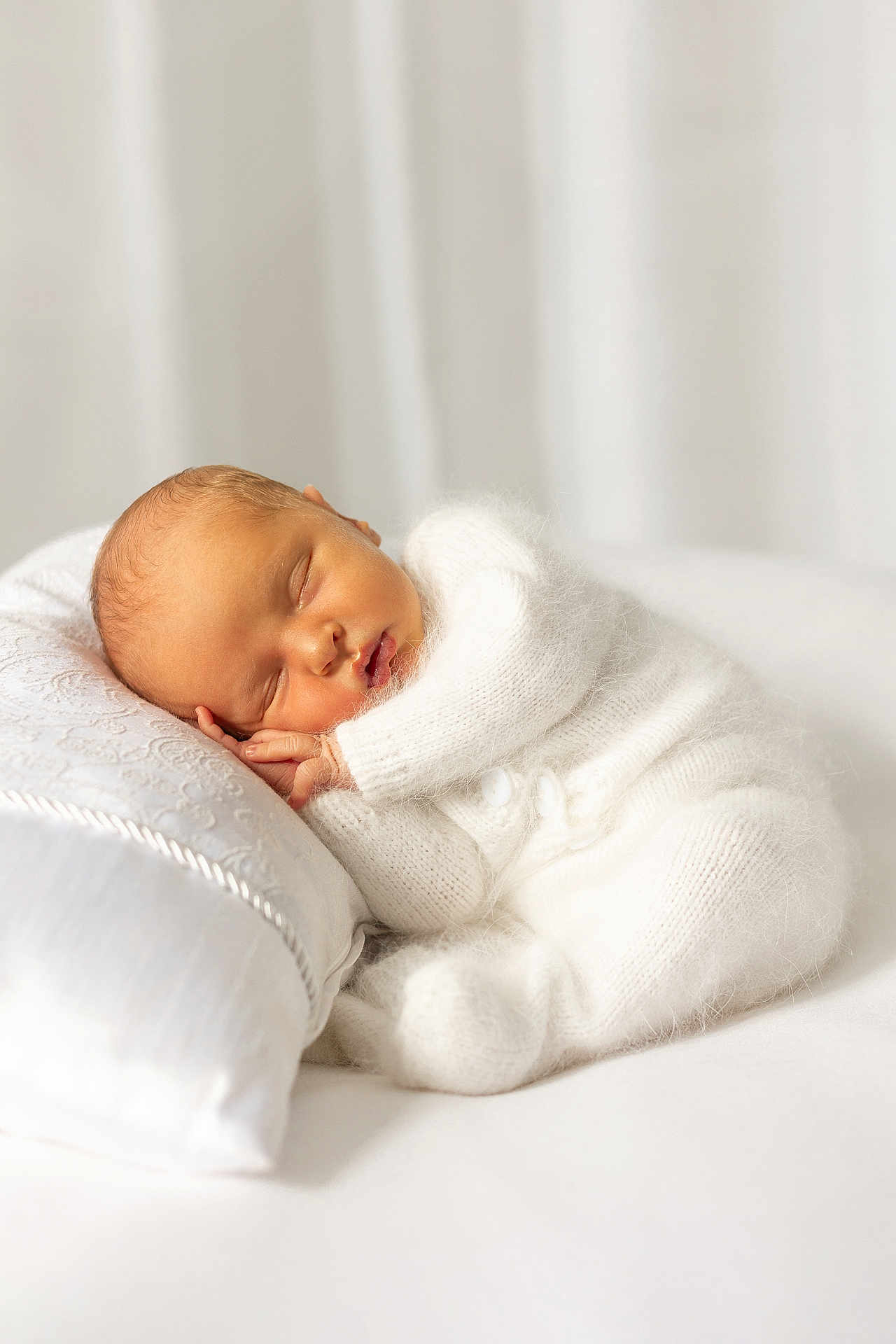Otto joined the competition — help win amazing prizes! newborn, baby, sleeping, white_outfit, pillow, soft_texture, cozy, peaceful, infant, portrait, cute, knitted_clothing, resting, indoor, blanket, calm, child, face, peace, toddler