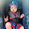 Bryce joined the competition — help win amazing prizes! baby, baby_clothes, blue_eyes, child, child_seat, closeup, cute, expression, hat, infant, legs, outdoor, person, romper, seatbelt, sitting, small_hands, stroller, summer_clothing, sun_hat