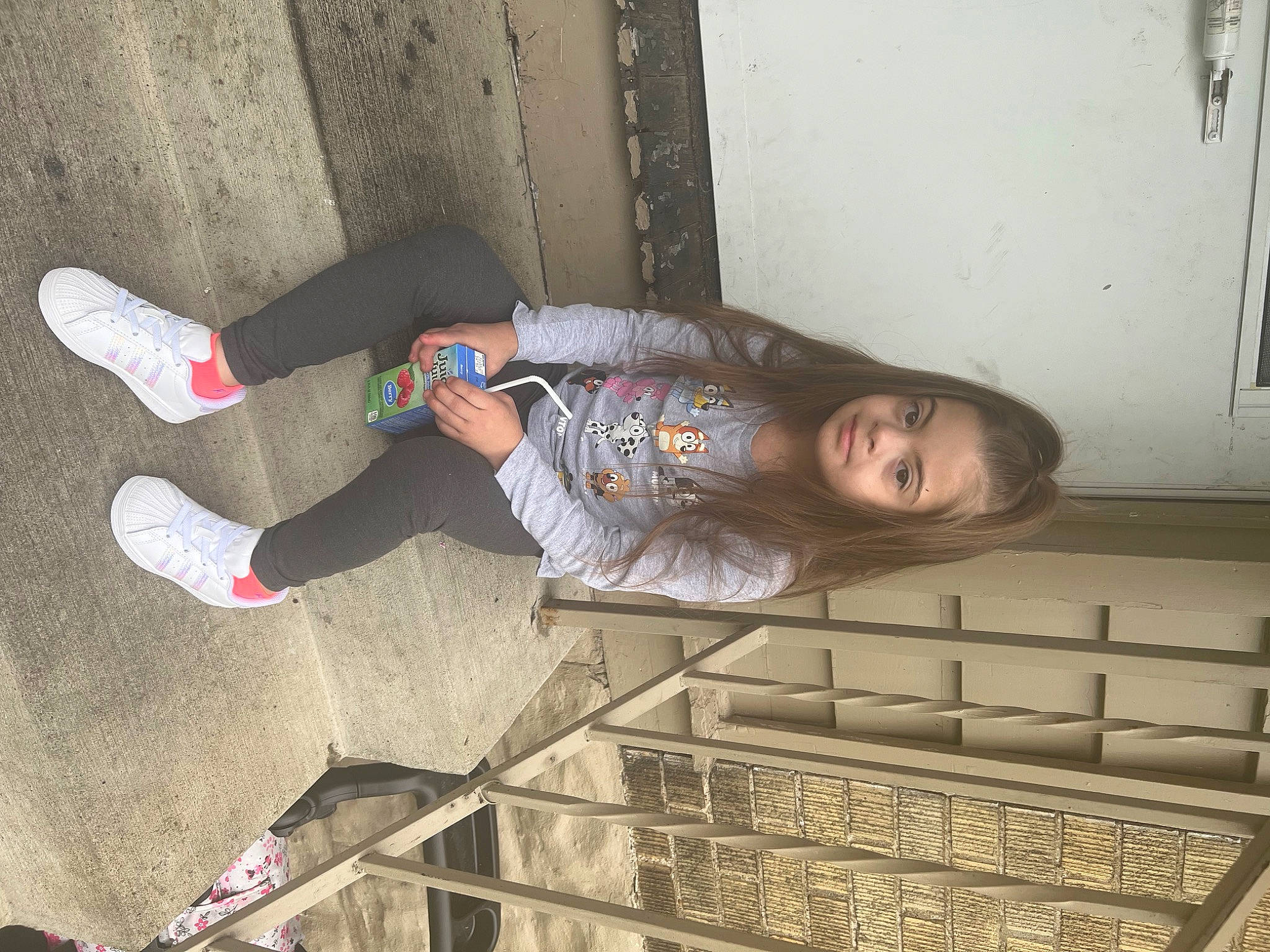 Aubree joined the competition — help win amazing prizes! child, comfort, concrete, denim, floor, flooring, foot, fun, human_leg, leg, pattern, person, shadow, shoe, sitting, sneakers, thigh, toddler, walking_shoe, wood