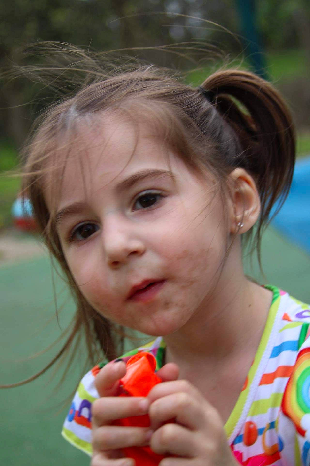 Braelynn joined the competition — help win amazing prizes! blond, child, close_up, event, face, fruit, fun, grass, hairstyle, happy, iris, leisure, lip, nose, person, plant, recreation, summer, toddler, toy