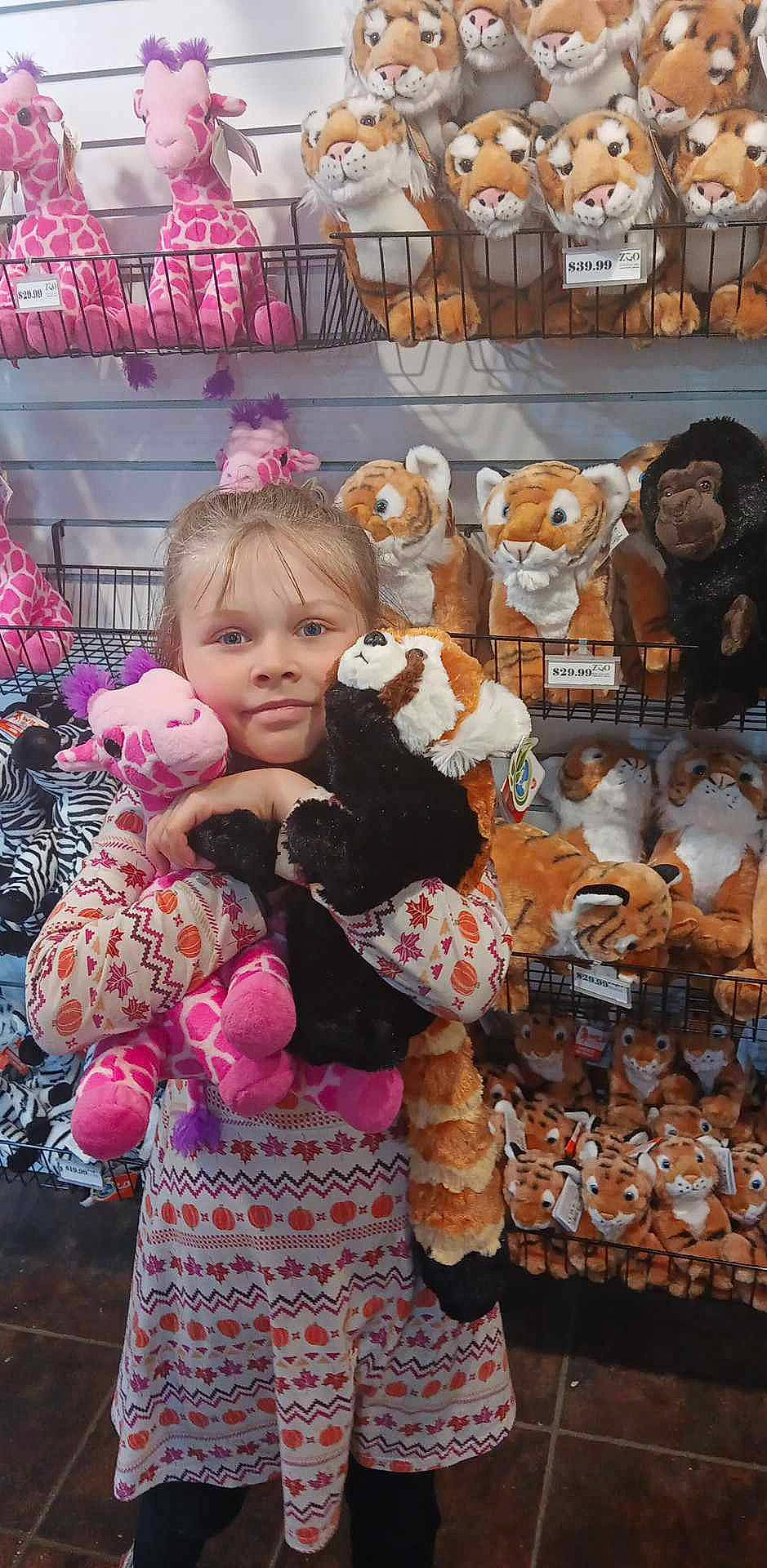 Star is registered to the contest to win money with this photo: baby_toddler_clothing, child, city, doll, event, fawn, fun, fur, holiday, market, person, pink, plush, retail, sitting, stuffed_toy, teddy_bear, textile, toddler, toy