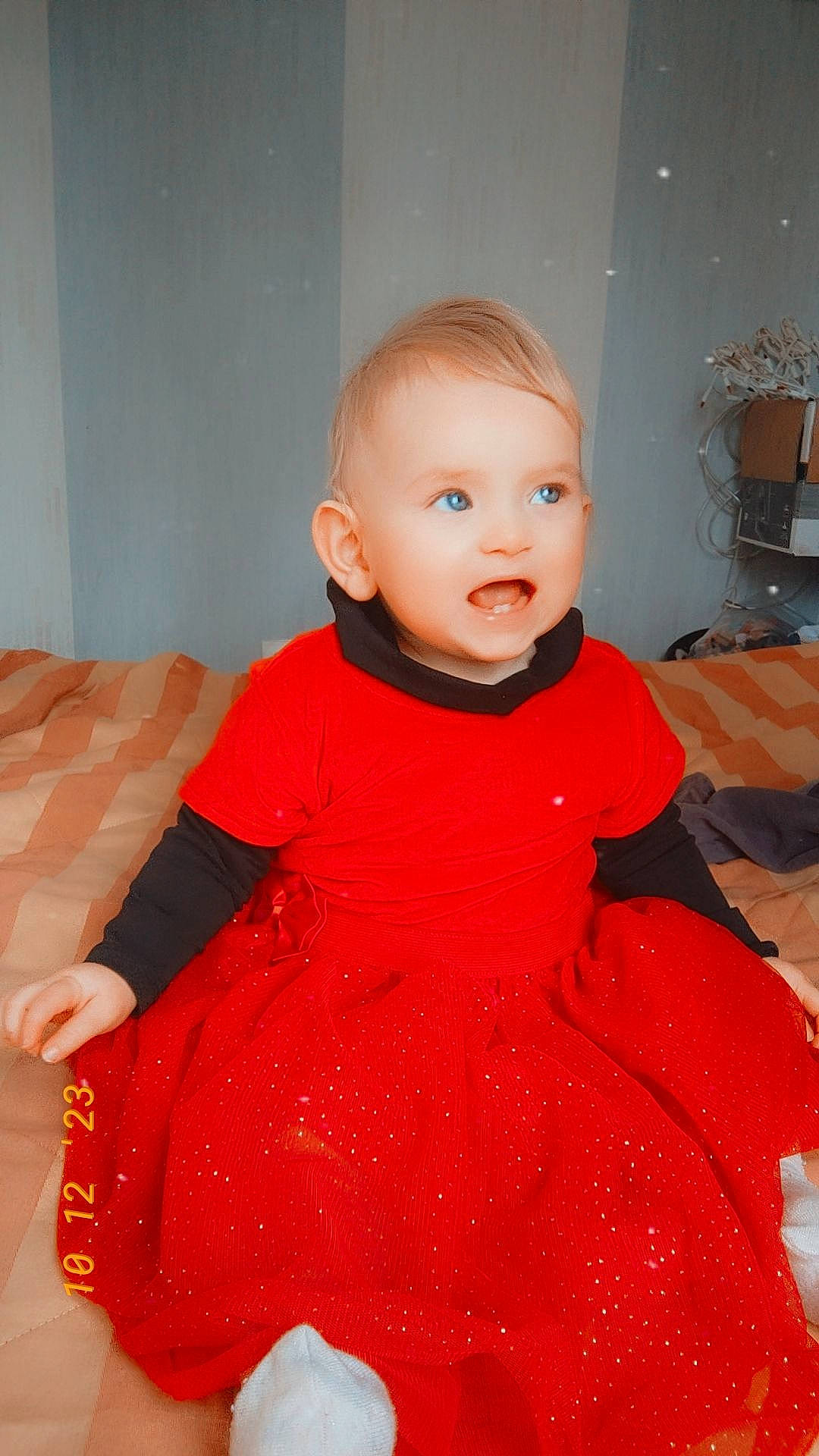Léonie Olry participe au concours pour gagner de l'argent avec cette photo : baby_toddler_clothing, cheek, child, chin, collar, day_dress, dress, face, fashion_design, flooring, hairstyle, head, neck, one_piece_garment, orange, person, pink, skin, sleeve, standing