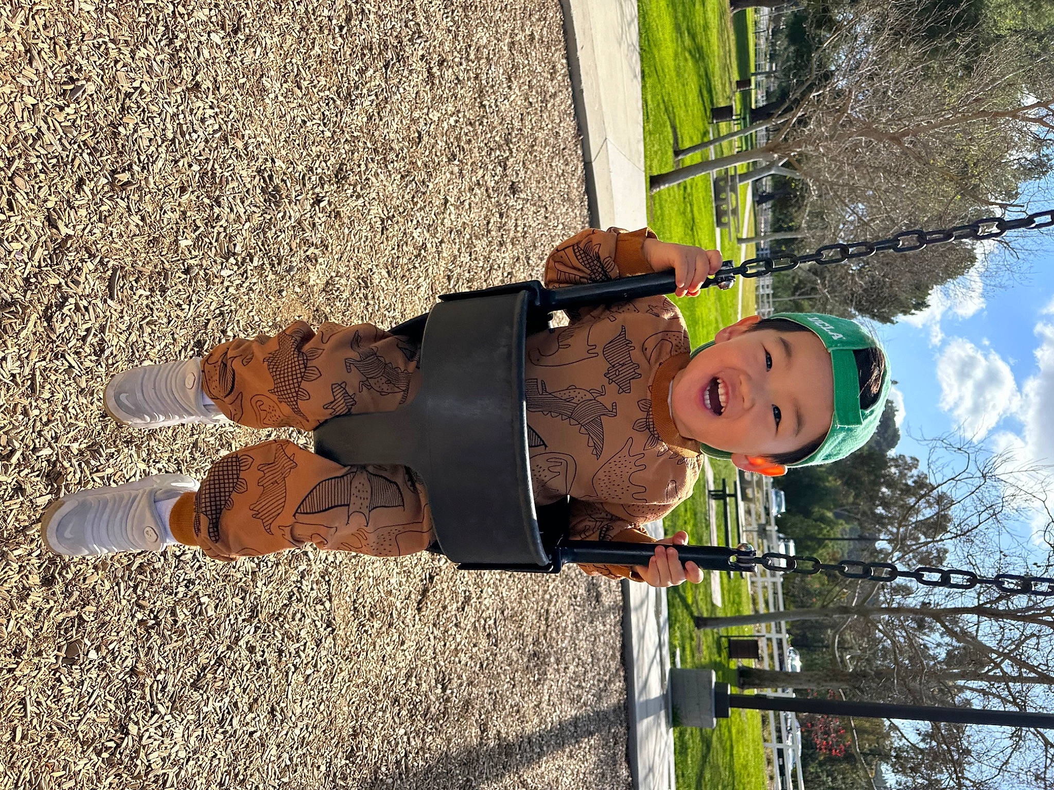 Julien is registered to the contest to win money with this photo: art, asphalt, cloud, fun, grass, human_leg, leisure, outdoor_shoe, people_in_nature, person, plant, road_surface, shadow, sidewalk, sky, smile, soil, tree, visual_arts, walking_shoe