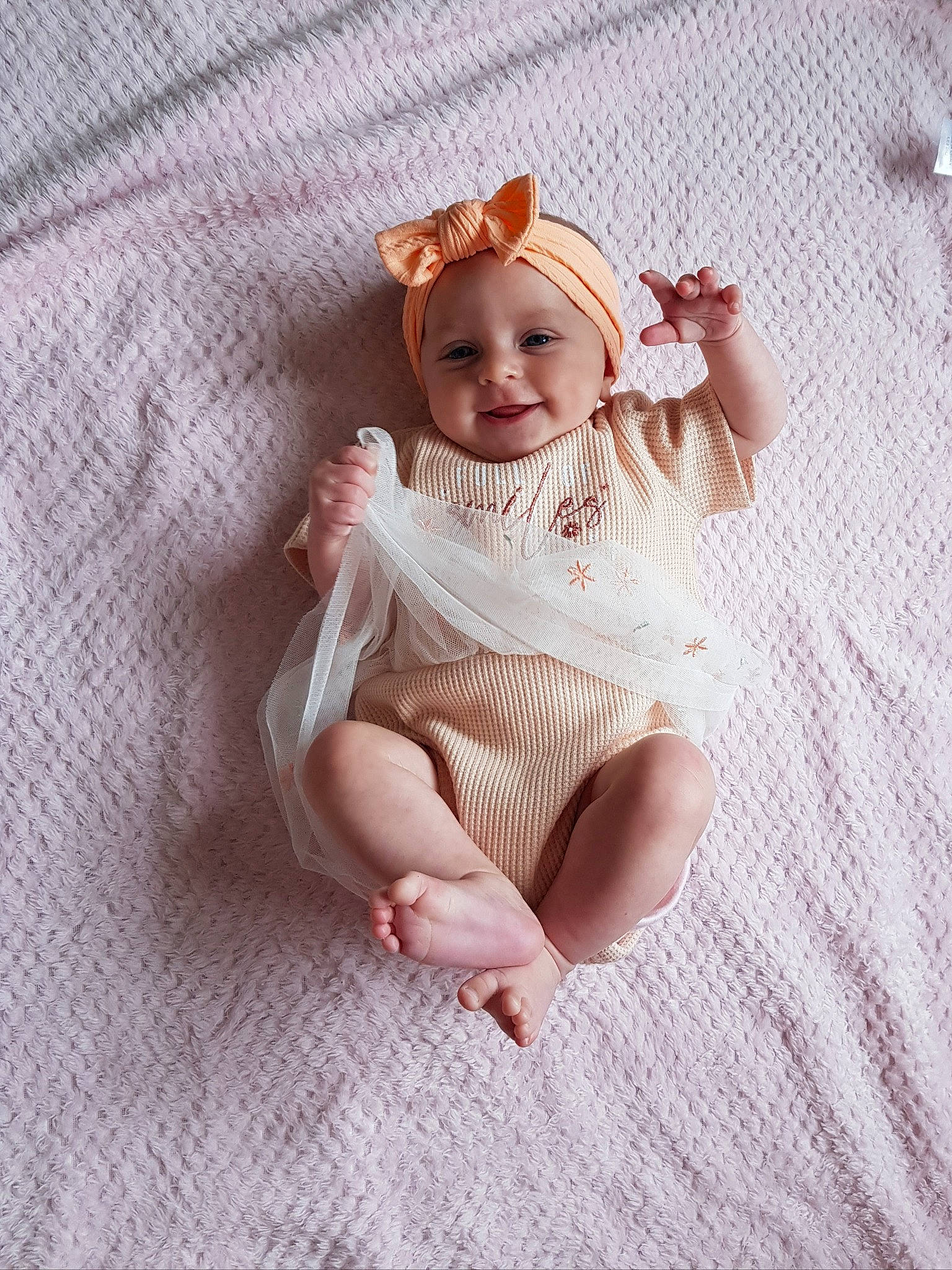Esmee joined the competition — help win amazing prizes! baby, baby_toddler_clothing, comfort, dress, fashion_accessory, finger, foot, hair_accessory, headwear, human_leg, iris, joy, linens, lip, pattern, person, skin, sleeve, smile, textile