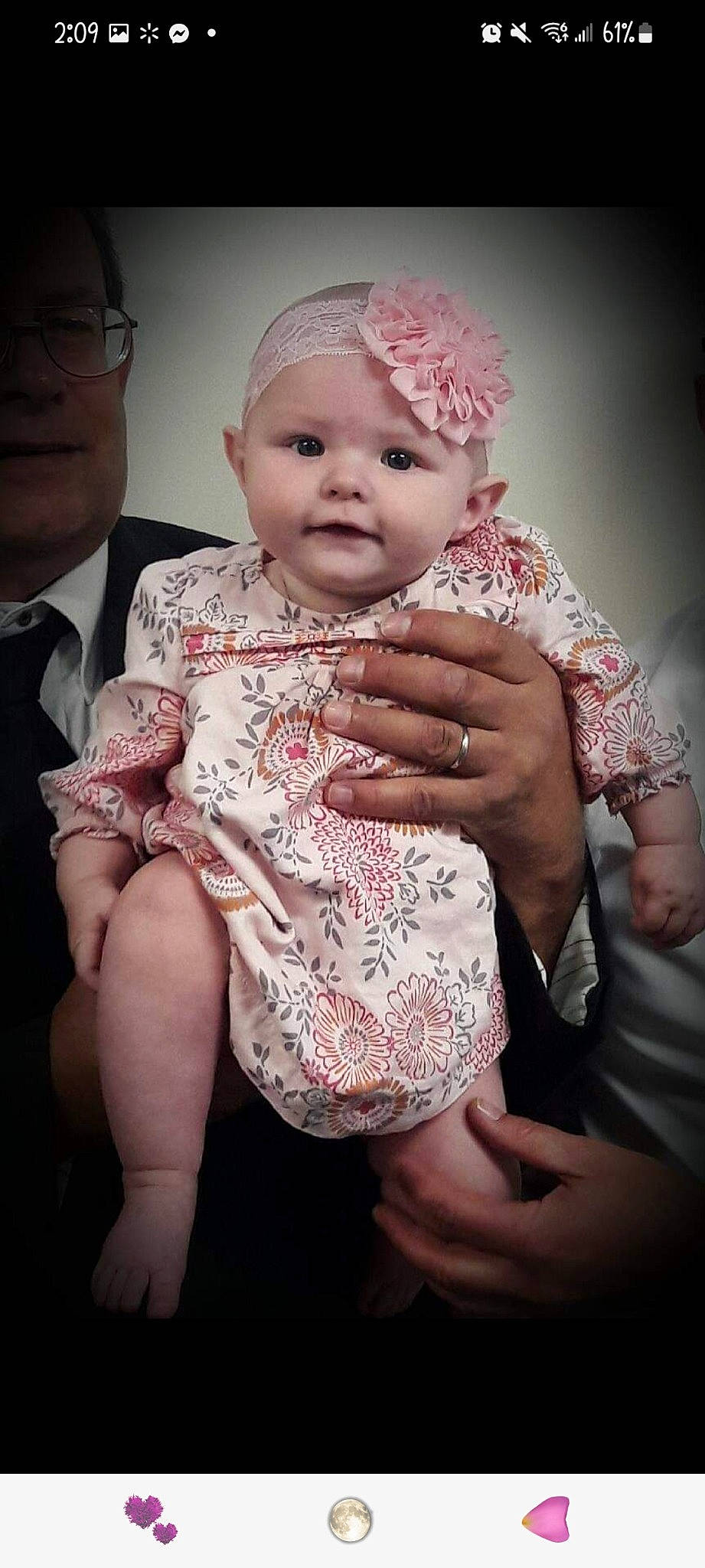 Mariyah is registered to the contest to win money with this photo: baby, baby_toddler_clothing, cheek, dress, eye, finger, flash_photography, fun, gesture, hand, happy, head, headpiece, headwear, iris, lip, mouth, person, pink, skin