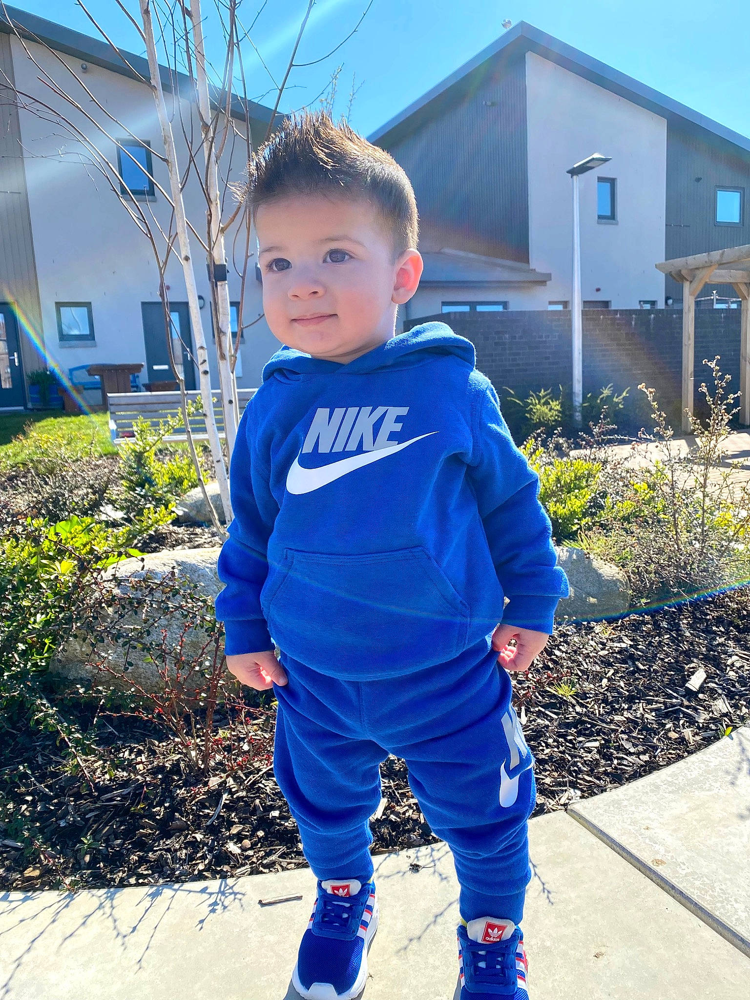David joined the competition — help win amazing prizes! azure, baby_toddler_clothing, blue, cool, denim, electric_blue, grass, happy, house, leaf, people_in_nature, person, plant, sky, sleeve, standing, street_fashion, sweatpant, t_shirt, toddler