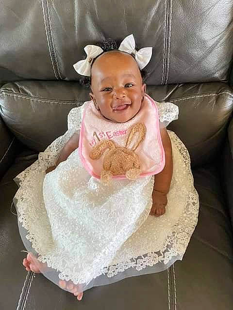 Harmony joined the competition — help win amazing prizes! baby, baby_toddler_clothing, bridal_accessory, chair, comfort, couch, dress, embellishment, event, eye, happy, headpiece, jewellery, linens, person, pink, sitting, sleeve, smile, textile