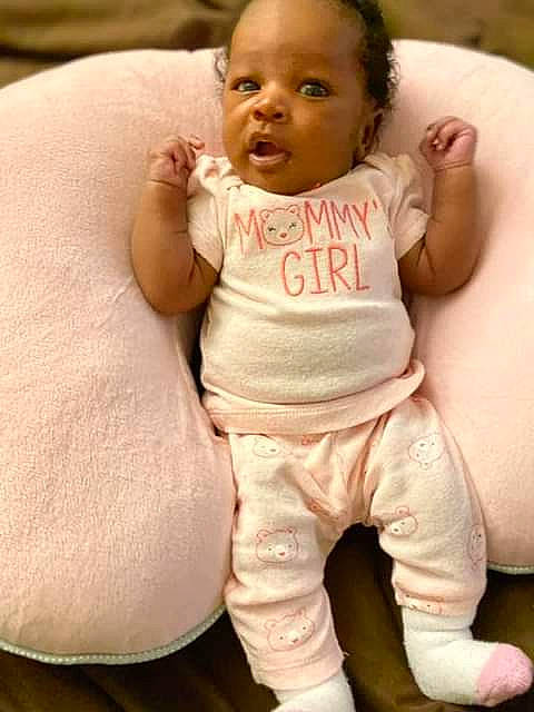 Harmony is registered to the contest to win money with this photo: baby, baby_toddler_clothing, cheek, chin, comfort, eye, face, gesture, hairstyle, happy, head, iris, lip, mouth, neck, nose, person, product, skin, sleeve