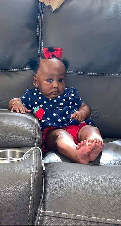 Harmony is registered to the contest to win money with this photo: baby, baby_toddler_clothing, comfort, electric_blue, eye, face, facial_expression, fashion, flash_photography, fun, hairstyle, happy, head, human, human_body, leg, person, product, sitting, skin