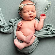 Alya participe au concours pour gagner de l'argent avec cette photo : newborn, baby, sleeping, swaddled, blanket, headband, flower, infant, skin, peaceful, resting, soft, cute, wrapped, pillow, portrait, indoors, child, toddler, cozy