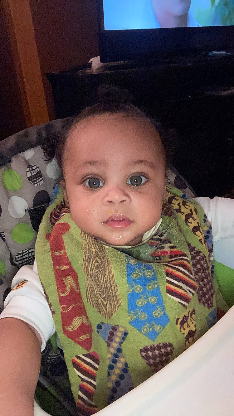 Kamron is registered to the contest to win money with this photo: arm, baby, baby_toddler_clothing, cheek, chin, ear, eye, eyebrow, face, finger, forehead, hair, hairstyle, head, iris, lip, mouth, nose, person, skin
