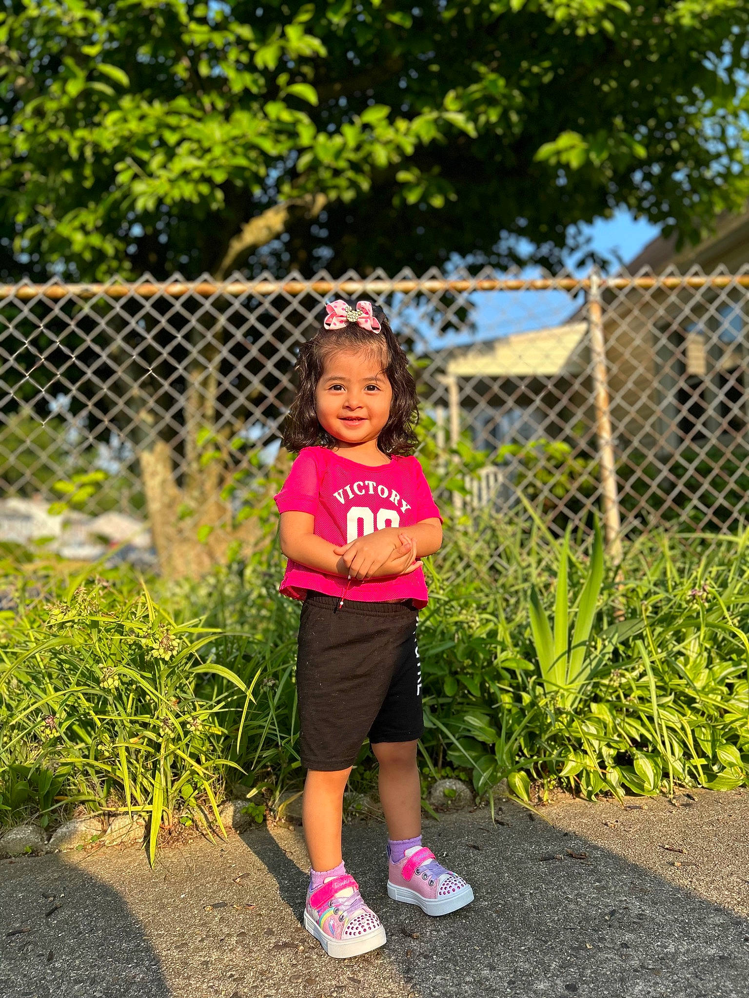 Catalina joined the competition — help win amazing prizes! asphalt, child, electric_blue, fence, fun, garden, grass, happy, home_fencing, joy, landscape, leisure, magenta, people_in_nature, person, plant, recreation, shorts, summer, t_shirt