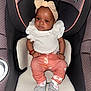 Zelestia is registered to the contest to win money with this photo: baby, car_seat, graco, infant, headband, bow, white_top, peach_pants, patterned_pants, gray_socks, child, seat, restraint, cute, infant_clothing, indoor, portrait, young_child, sitting, calm