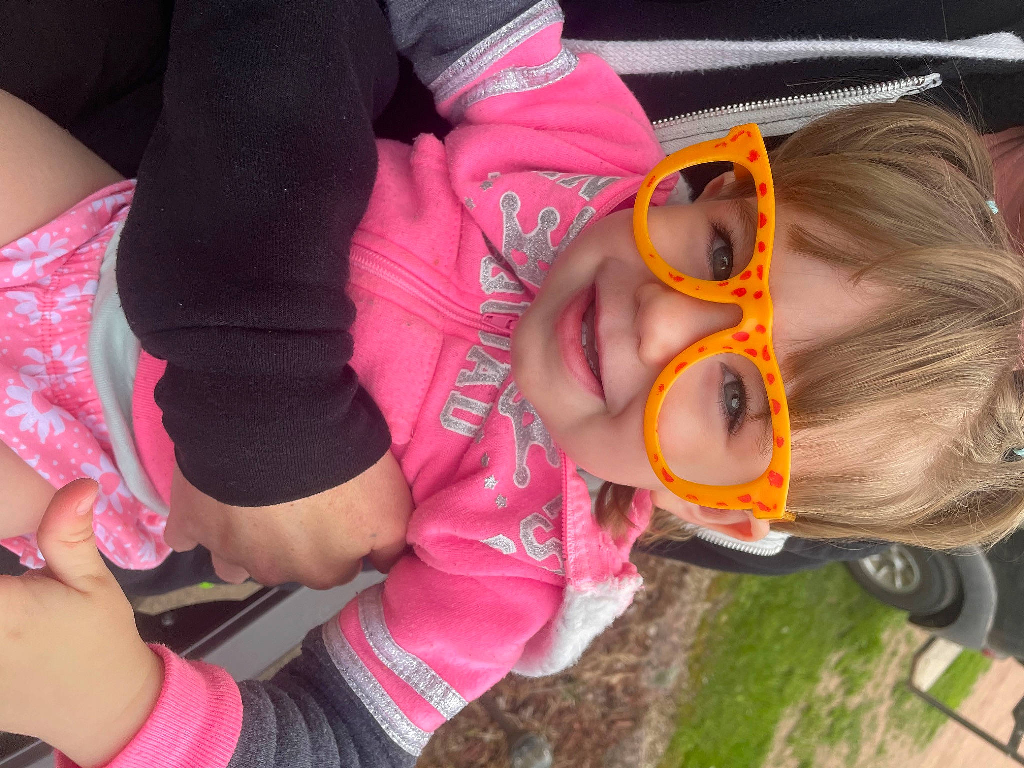 Laken joined the competition — help win amazing prizes! baby, baby_toddler_clothing, child, eyewear, fun, grass, hat, human_leg, magenta, mouth, nose, person, personal_protective_equipment, pink, recreation, smile, sunglasses, thigh, toddler, tree