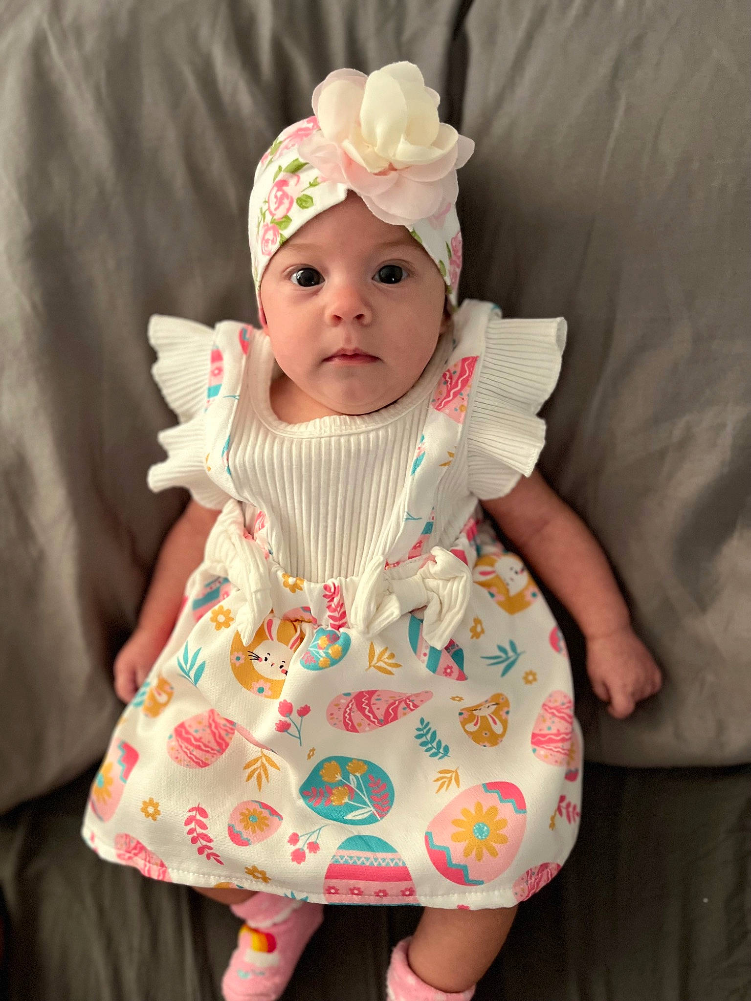 Mya joined the competition — help win amazing prizes! baby, baby_products, baby_toddler_clothing, cap, child, costume_hat, dress, eye, happy, hat, head, headwear, human_body, pattern, peach, person, pink, sleeve, sun_hat, textile
