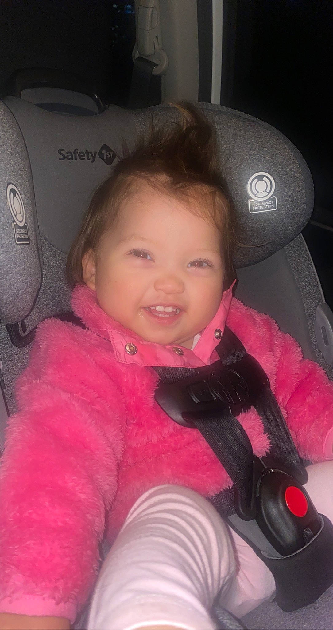 Aniyah is registered to the contest to win money with this photo: auto_part, automotive_design, car_seat, cheek, comfort, cool, finger, flash_photography, happy, head, head_restraint, joy, nose, person, pink, product, skin, smile, steering_wheel, thumb