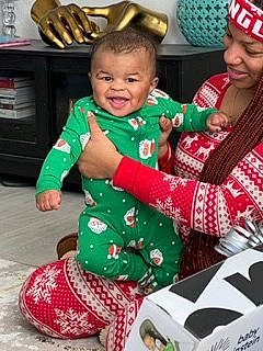 Preston joined the competition — help win amazing prizes! baby, baby_toddler_clothing, cap, chair, child, christmas_eve, event, flooring, fun, green, happy, holiday, joy, lap, pattern, person, play, sitting, smile, snapshot