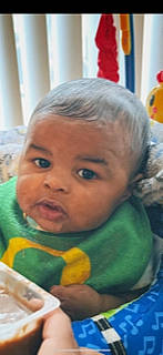 Preston is registered to the contest to win money with this photo: baby, cheek, child, ear, event, eyebrow, eyelash, forehead, fun, happy, iris, mouth, nose, person, play, room, sitting, toddler