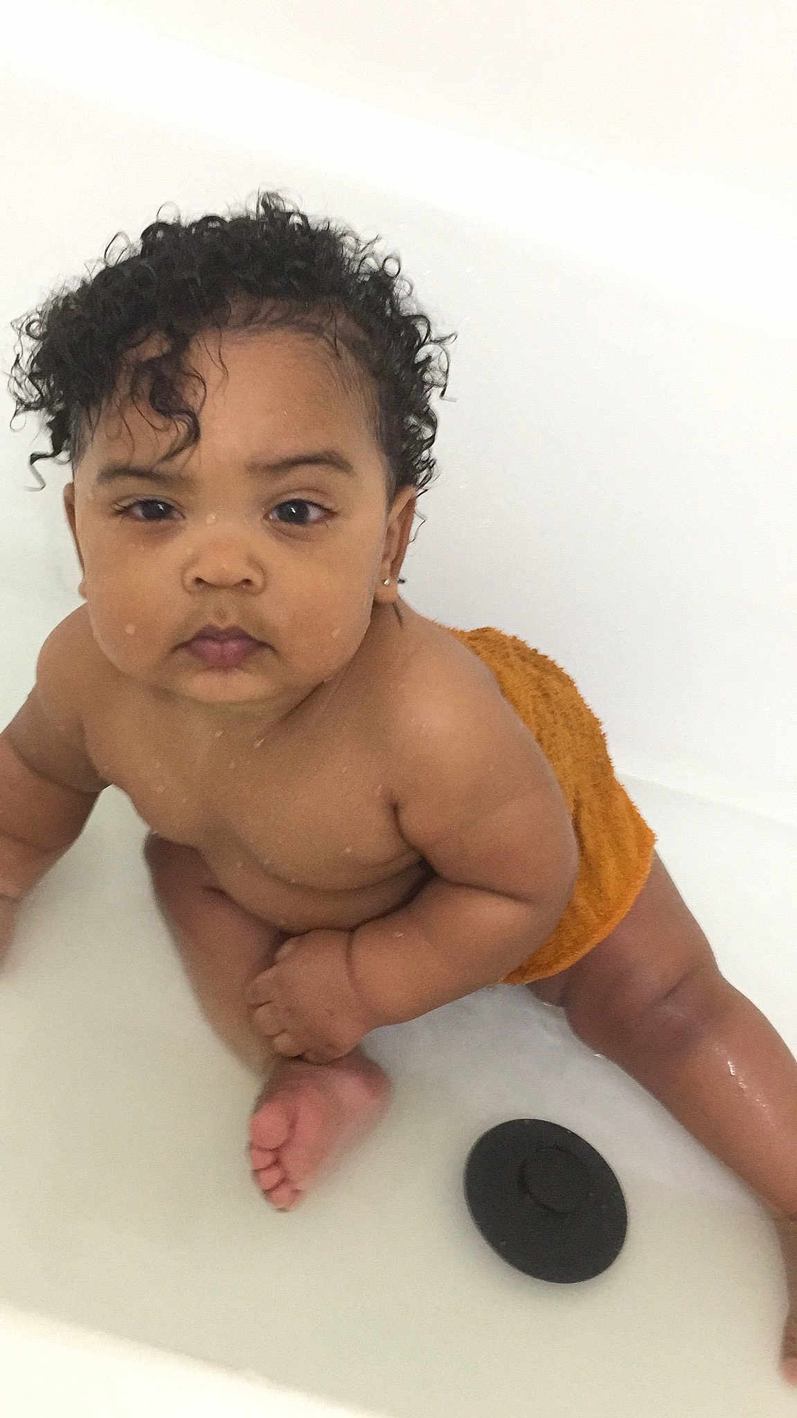 Sir Garland is registered to the contest to win money with this photo: arm, baby, barechested, bathing, black_hair, cheek, chest, child, muscle, neck, nose, person, skin, stomach, toddler, trunk