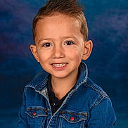 Angelo participe au concours pour gagner de l'argent avec cette photo : boy, buttoned_jacket, casual_clothing, child, childhood, cute, denim_jacket, face, fashion, friendly, happy, indoors, kid, person, photography, portrait, smiling, spiky_hair, studio_background, young