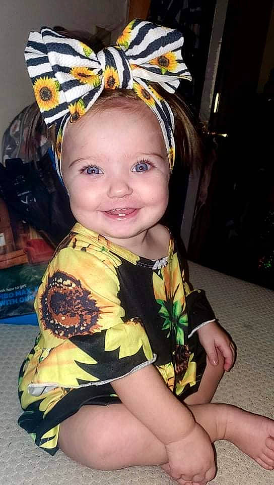 Ayrabella is registered to the contest to win money with this photo: arthropod, baby, baby_toddler_clothing, cheek, child, event, fun, happy, head, headband, headpiece, headwear, insect, iris, joy, organ, person, pollinator, skin, smile