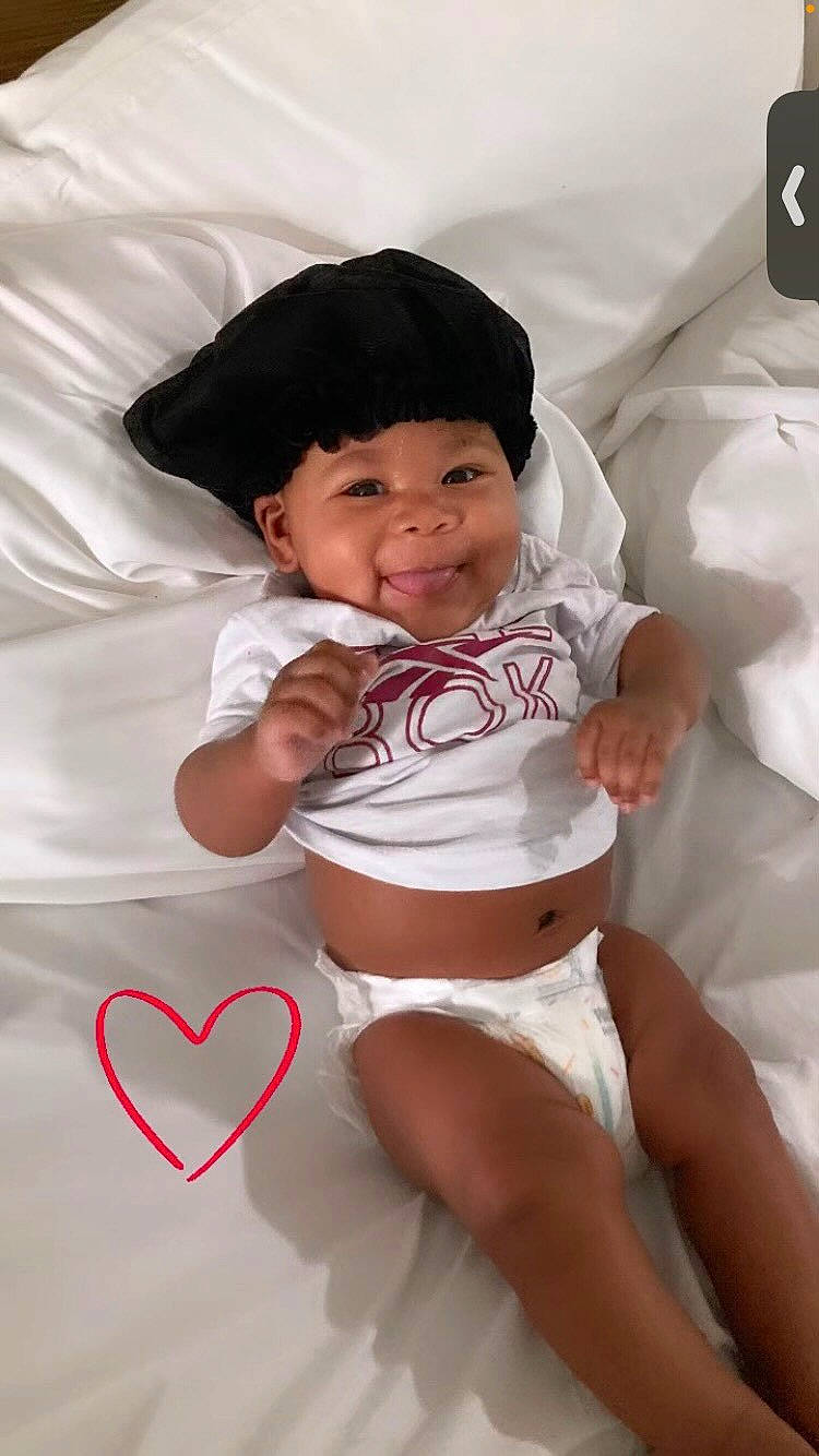 Ci'Erra joined the competition — help win amazing prizes! baby, baby_toddler_clothing, black_hair, chest, comfort, eye, facial_expression, happy, human_body, joy, person, pink, shorts, skin, sleeve, smile, stomach, textile, thigh, toddler