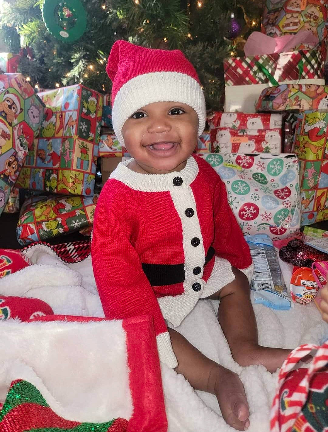 Kahmari joined the competition — help win amazing prizes! baby_toddler_clothing, child, christmas, christmas_decoration, christmas_eve, christmas_ornament, christmas_tree, dress, event, green, happy, headwear, holiday, joy, pattern, person, pink, product, red, sleeve