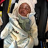 baby, bundle, car_seat, child, clothing, coat, comfort, cute, face, hat, headwear, indoors, infant, portrait, rest, seat, sleeping, soft, warm, warning_label