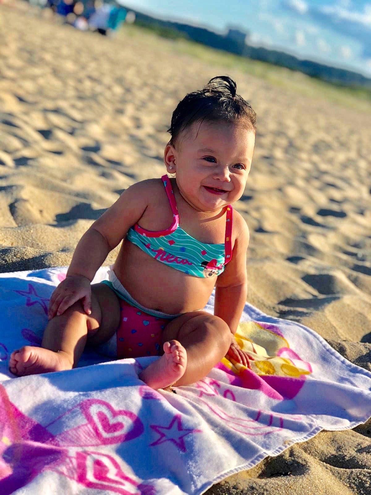 Jaylani joined the competition — help win amazing prizes! beach, child, fun, happy, leisure, person, play, sand, sea, smile, summer, sun_tanning, sunlight, swimwear, toddler, vacation