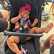 Alanii joined the competition — help win amazing prizes! baby, infant, sleeping, stroller, pink_headband, flower, bracelet, jewelry, harness, outdoor, sunlight, family, vacation, shopping, wheelchair, sandals, toys, pacifier, portrait, relaxed