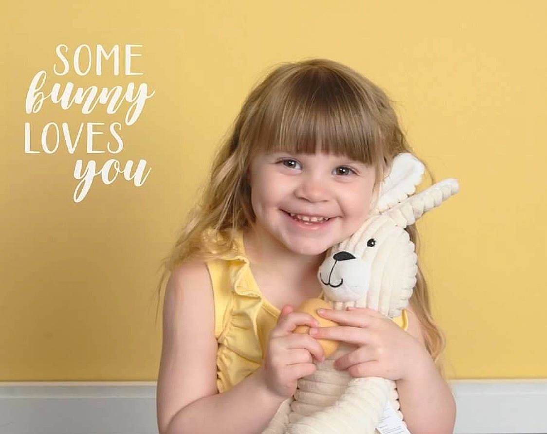 Audreianna joined the competition — help win amazing prizes! baby_toddler_clothing, bangs, cheek, child, eyelash, fashion_accessory, finger, font, gesture, happy, joy, nail, person, photo_caption, portrait_photography, room, sitting, skin, sleeve, smile