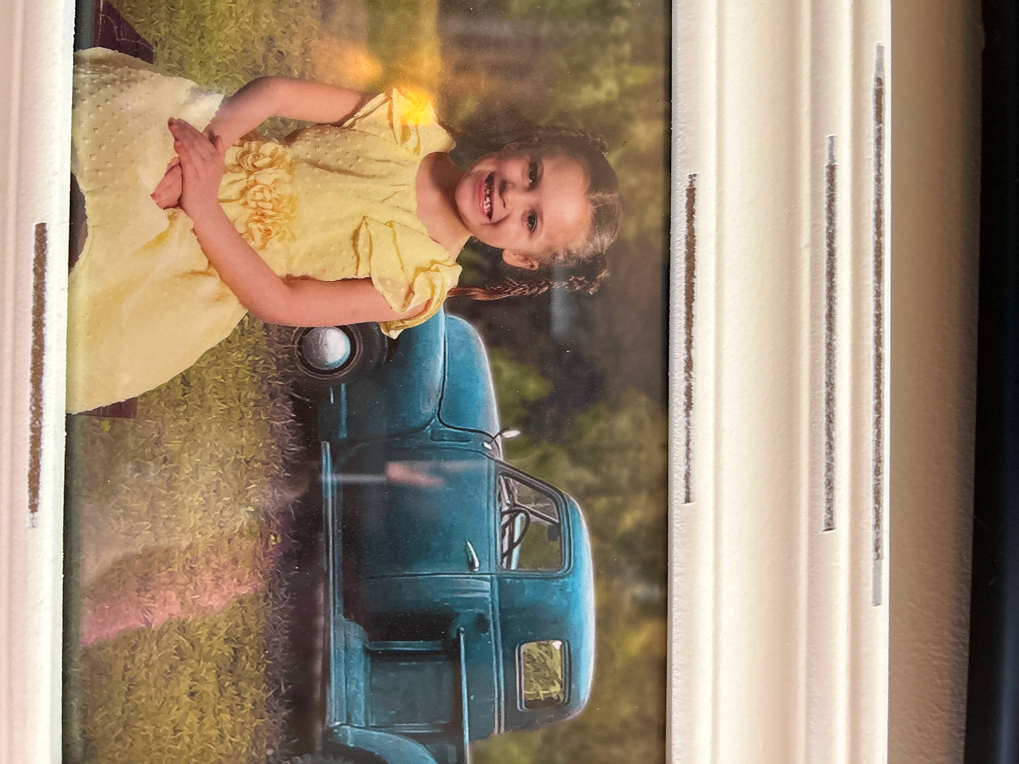 Addilynn joined the competition — help win amazing prizes! auto_part, automotive_exterior, automotive_lighting, denim, fun, glass, happy, joy, machine, motor_vehicle, person, public_transport, reflection, room, sitting, smile, standing, t_shirt, tints_and_shades, vehicle_door