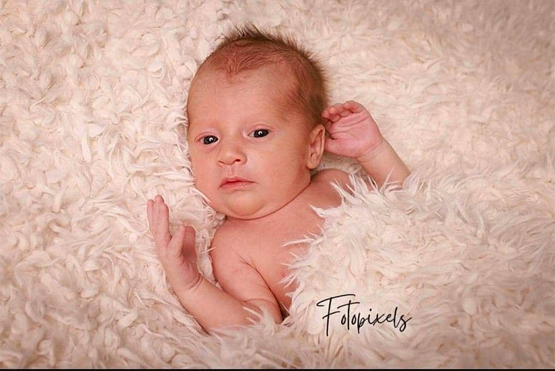 Nathanaël participe au concours pour gagner de l'argent avec cette photo : art, baby, baby_toddler_clothing, cheek, child, comfort, eyelash, flash_photography, fur, happy, iris, linens, pattern, peach, person, portrait, portrait_photography, sitting, skin, toddler