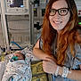 woman, infant, baby, hospital, medical_equipment, blanket, glasses, smile, bed, patient, healthcare, pacifier, gown, monitor, person, care, nurse, mother, newborn, indoor