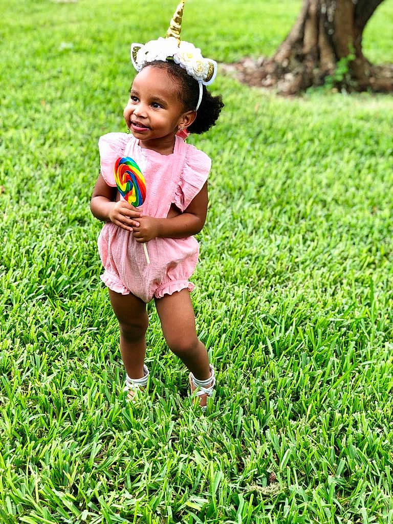 Kori is registered to the contest to win money with this photo: baby, child, dress, flower, fun, grass, grass_family, green, happy, joy, lawn, meadow, people_in_nature, person, photography, pink, plant, play, smile, summer