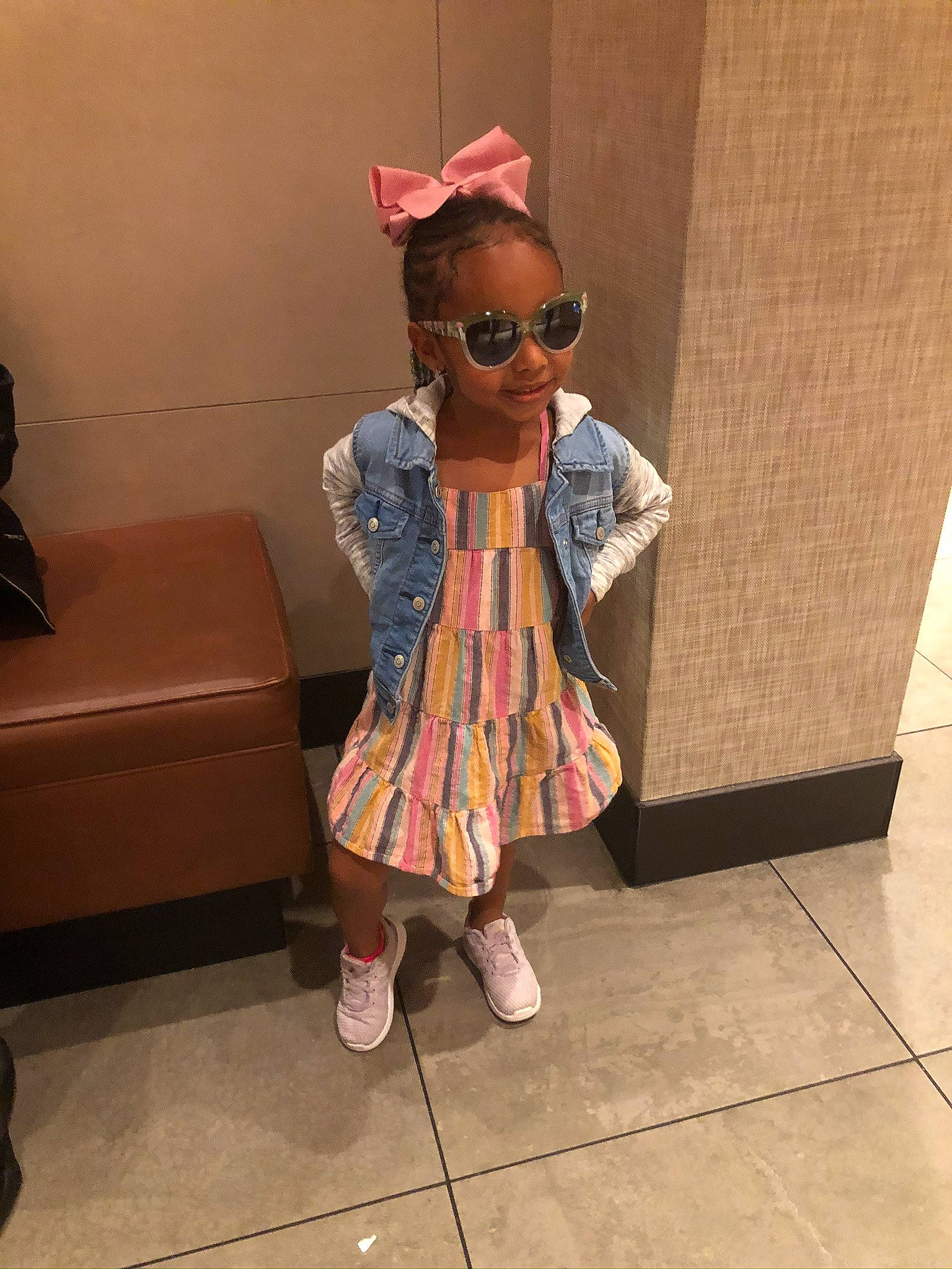 Kori is registered to the contest to win money with this photo: child, eyewear, fashion_accessory, fawn, glasses, outerwear, person, shoe, style, sunglasses