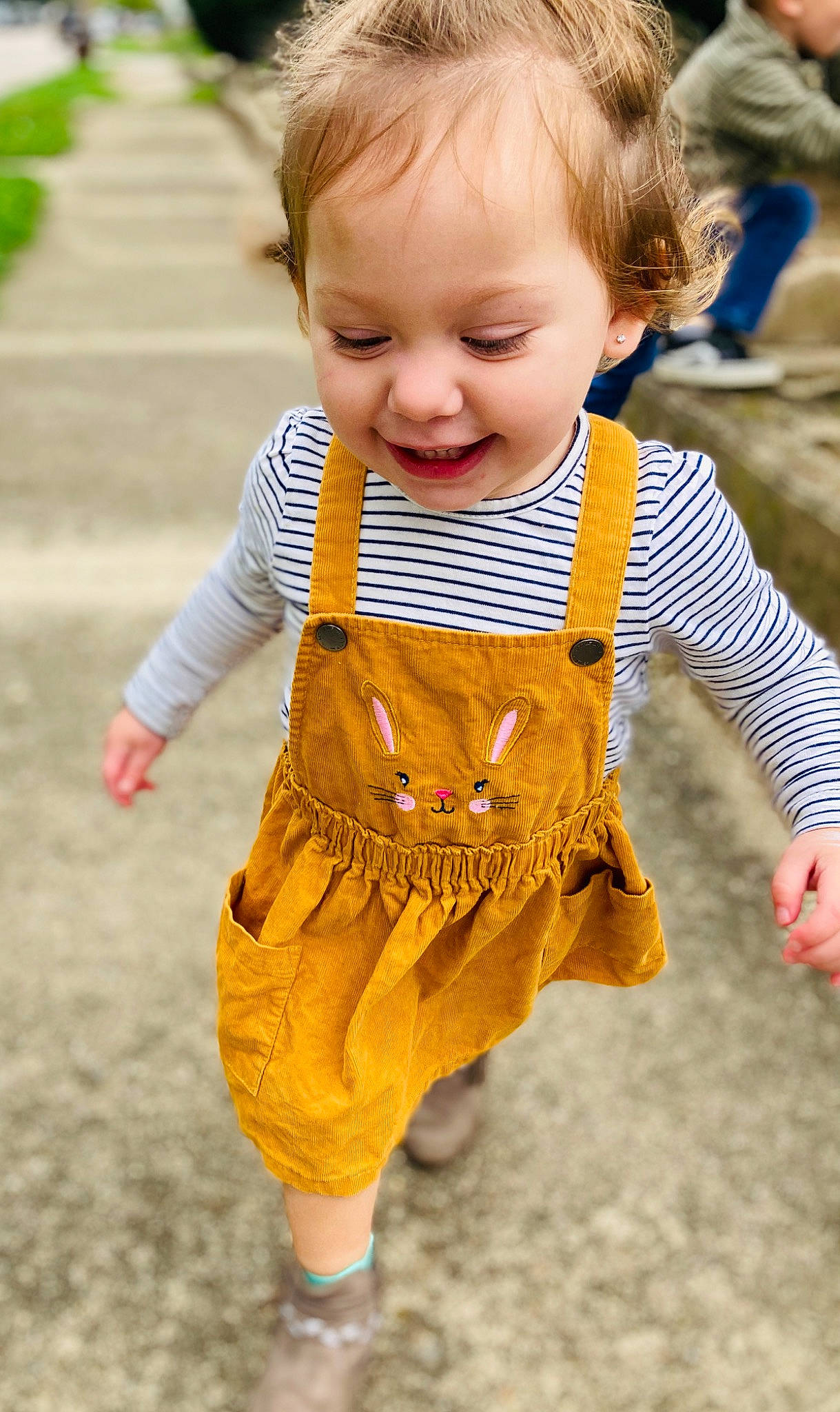 Esperanza is registered to the contest to win money with this photo: baby, baby_toddler_clothing, beauty, child, face, grass, hairstyle, happy, head, joy, orange, people, people_in_nature, person, photograph, skin, sleeve, smile, summer, t_shirt
