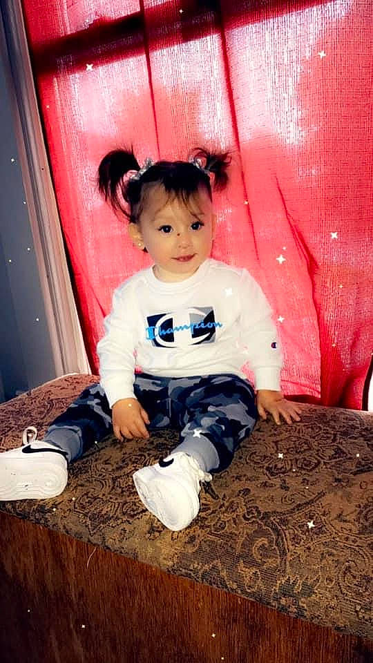 Esperanza is registered to the contest to win money with this photo: baby, baby_toddler_clothing, child, curtain, flash_photography, fun, happy, magenta, pattern, person, pink, play, room, sitting, sleeve, smile, t_shirt, tints_and_shades, toddler, vintage_clothing