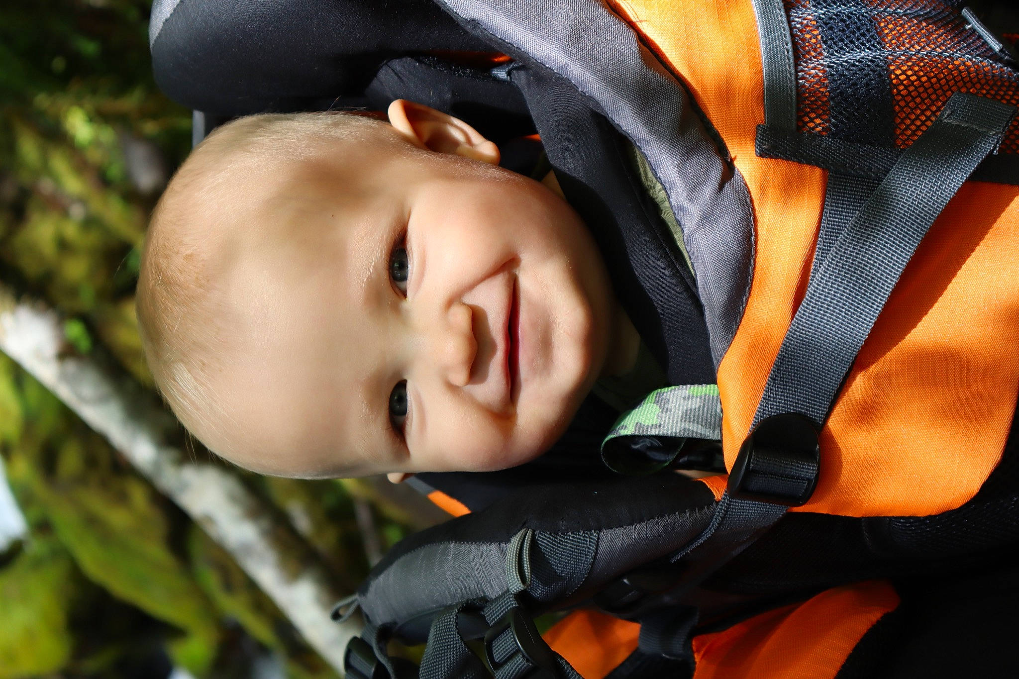 Jericho is registered to the contest to win money with this photo: baby, baby_laughing, baby_products, baby_toddler_clothing, child, flash_photography, fun, grass, happy, head, joy, people_in_nature, person, personal_protective_equipment, plant, portrait_photography, smile, toddler, tree
