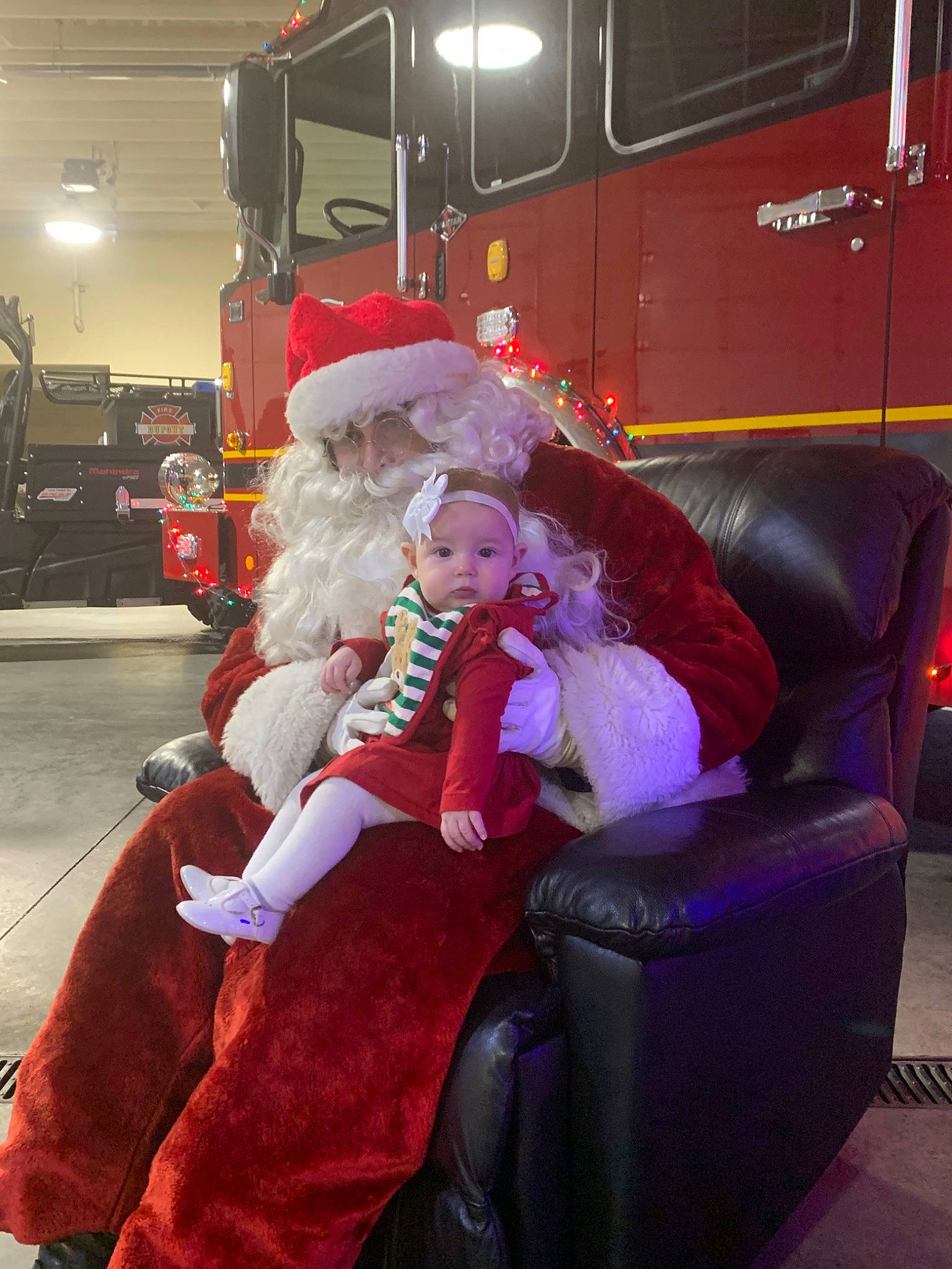Ainsleigh joined the competition — help win amazing prizes! car, christmas, christmas_eve, fictional_character, fun, fur, lap, passenger, person, santa_claus, sitting, toddler, transport, vehicle