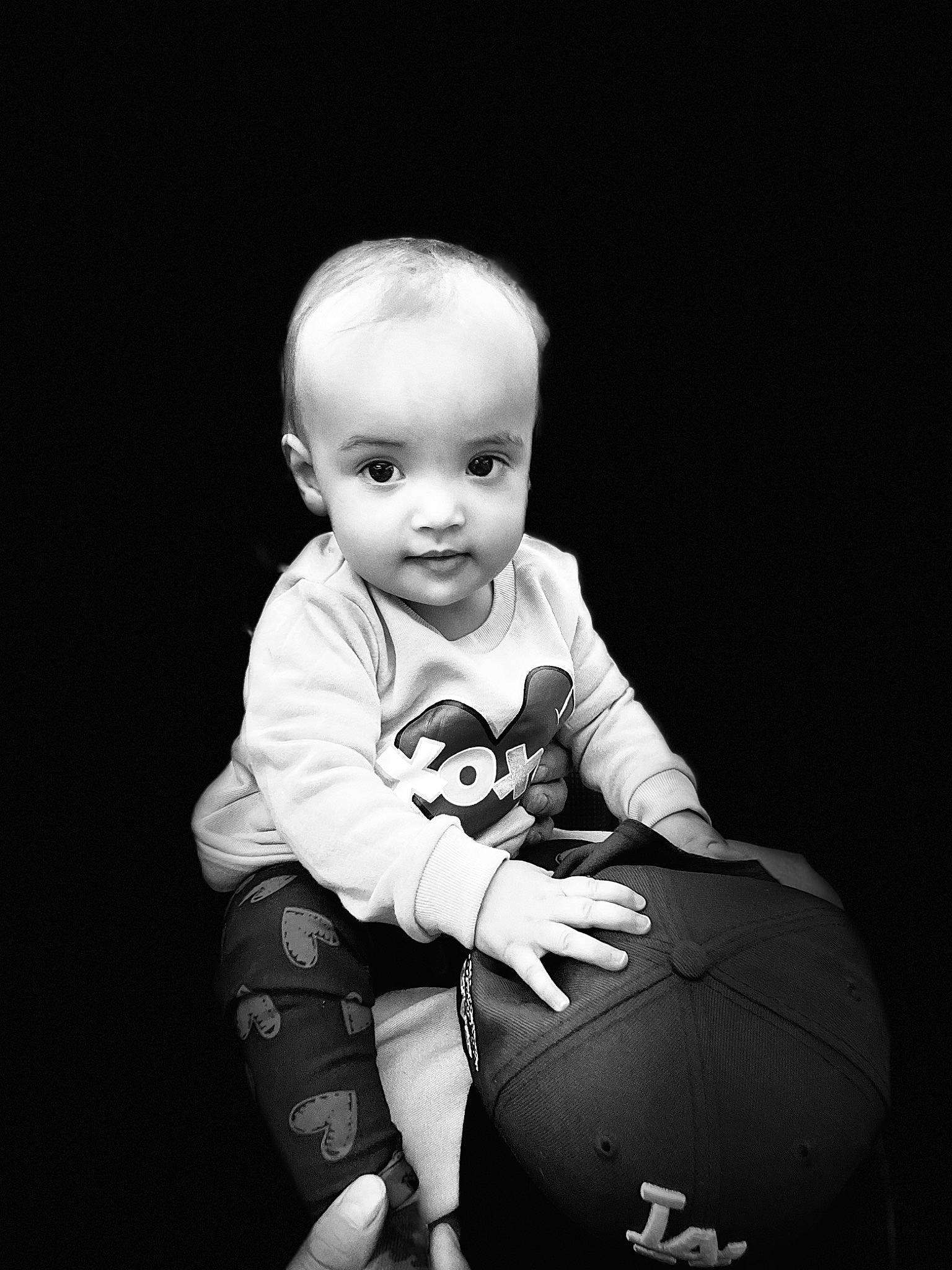 Mariah Jaylo Mcdaniel joined the competition — help win amazing prizes! baby, baby_toddler_clothing, child, comfort, darkness, elbow, flash_photography, fun, gesture, happy, human_leg, knee, monochrome, monochrome_photography, person, portrait, portrait_photography, sitting, still_life_photography, style