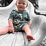 baby, child, slide, playground, outdoor, smile, romper, pointing, happy, infant, cute, park, summer, sitting, foot, legs, face, portrait, toy, fun