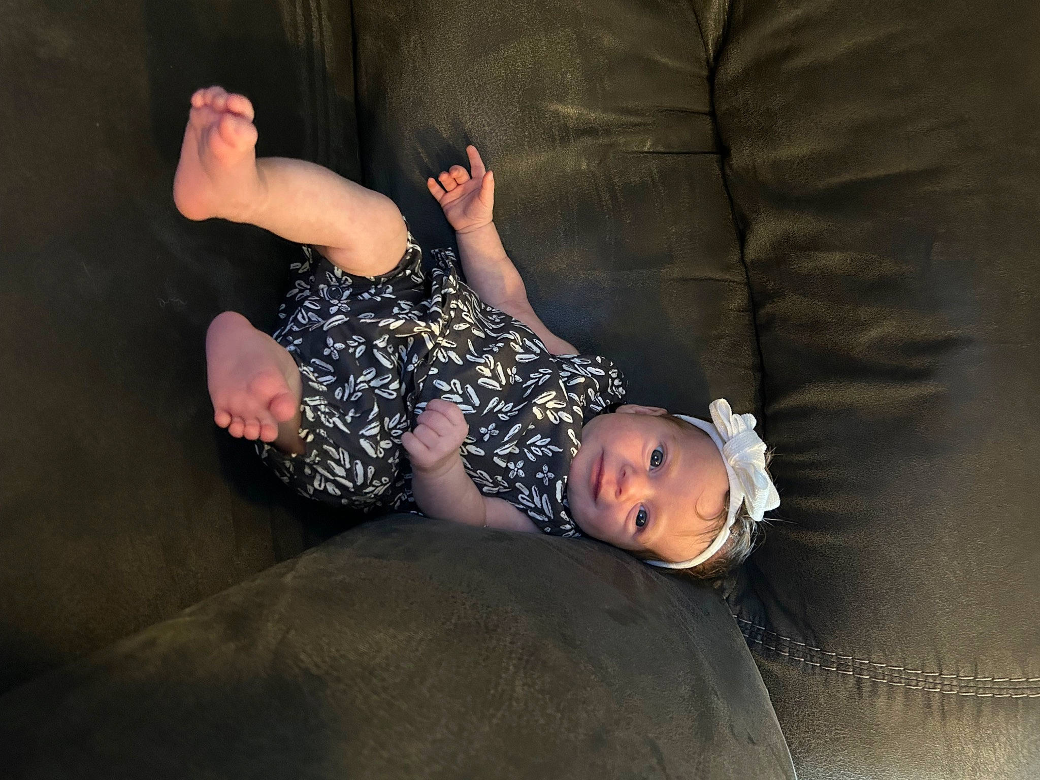 Karissa joined the competition — help win amazing prizes! baby_toddler_clothing, barefoot, comfort, elbow, flash_photography, flooring, foot, fun, grey, human_body, human_leg, knee, leg, pattern, person, sitting, sleeve, sock, thigh, wood