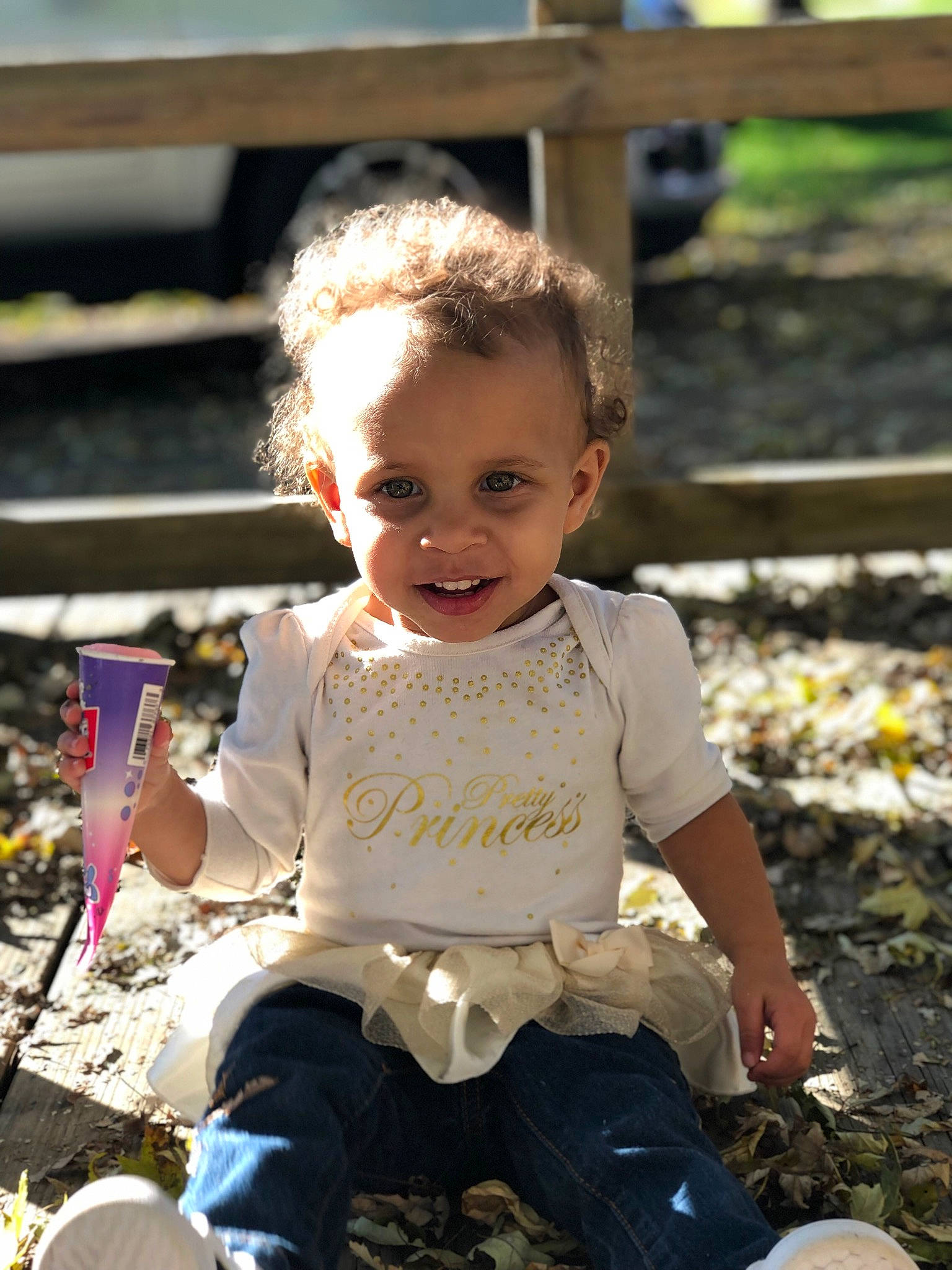 Kayloni is registered to the contest to win money with this photo: adaptation, baby, baby_toddler_clothing, child, face, facial_expression, fun, grass, happy, iris, joy, leisure, people, people_in_nature, person, recreation, sitting, skin, smile, soil