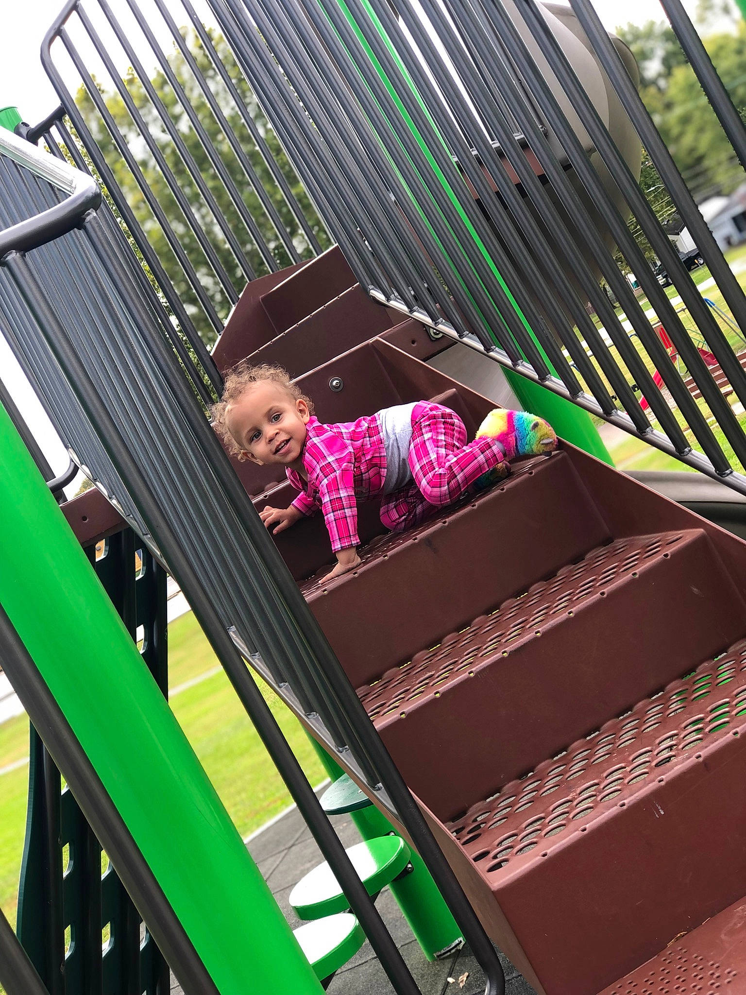 Kayloni is registered to the contest to win money with this photo: baby, baby_toddler_clothing, child, city, fun, grass, human_settlement, leaf, leisure, magenta, outdoor_furniture, pattern, person, pink, product, public_space, recreation, tints_and_shades, toddler, tree