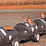 Xanderlee joined the competition — help win amazing prizes! child, children, barrel_train, cow_pattern, outdoor, fall, autumn, field, grass, cornfield, trees, play, fun, ride, toy, wheels, seat, farm, smile, daytime