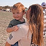 Xanderlee joined the competition — help win amazing prizes! toddler, child, woman, outdoor, grass, field, smile, holding, casual_clothing, jeans, tshirt, sunny, daylight, person, hair, happy, nature, family, portrait, back_view