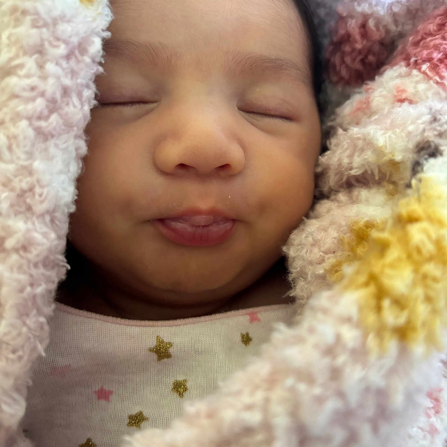 Anaiyah is registered to the contest to win money with this photo: baby, blanket, bodypart, bonnet, clothing, face, finger, hand, hat, head, hood, hoodie, knitwear, newborn, person, photography, portrait, quilt, sleeping, towel